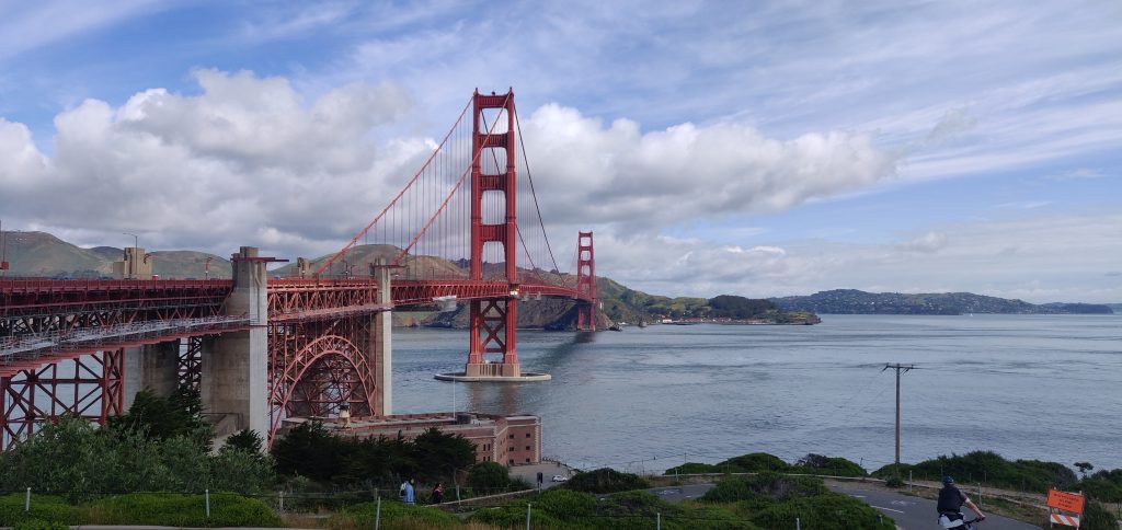 Photograph of the Golden Gate Bridge from the San Francisco side. The bridge takes up about half of the frame, the right side is all bay. SF Viaduct visible in the foreground.