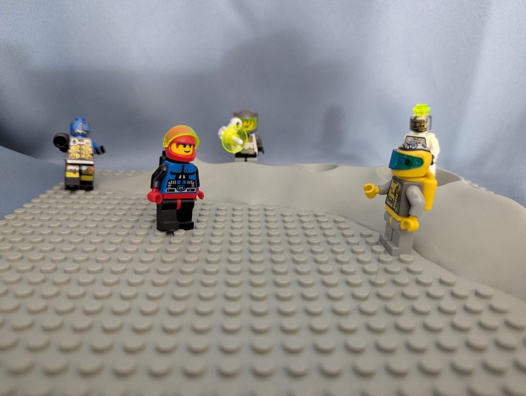 Several vintage Lego figures illustrating themes not covered in the book